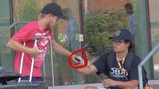 Taking People's Phones with Crutches Prank
