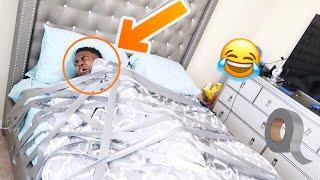 DUCT TAPE TO BED PRANK ON BOYFRIEND!!!
