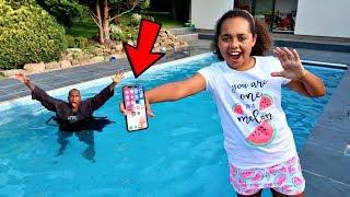 MY DAD'S iPhone X IN OUR SWIMMING POOL PRANK!!